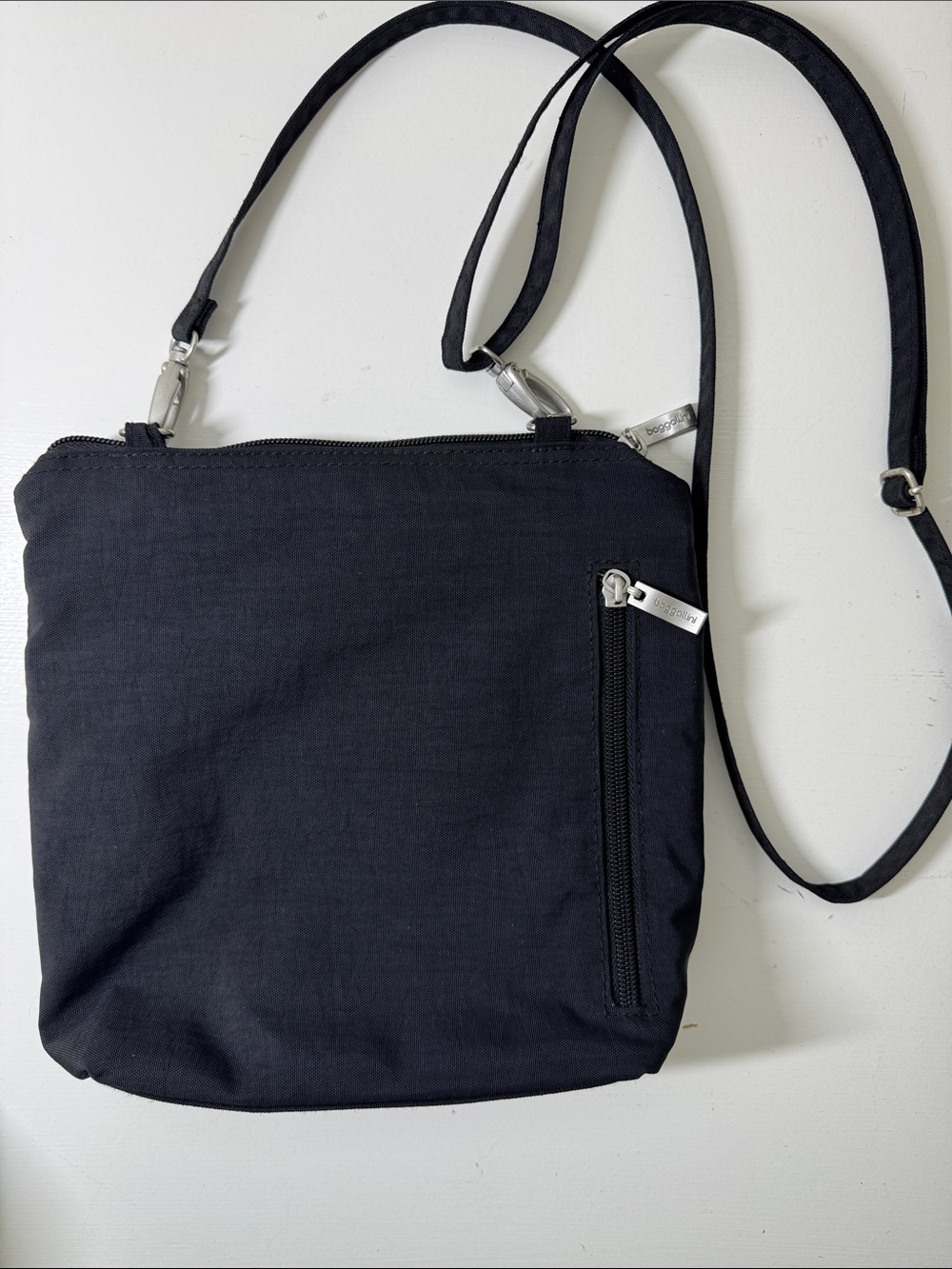 Baggalini black nylon crossbody bag with matching integrated mini bag/wallet. - Picture 6 of 16